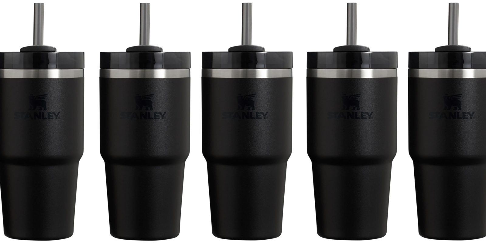 A group of black tumblers with straws