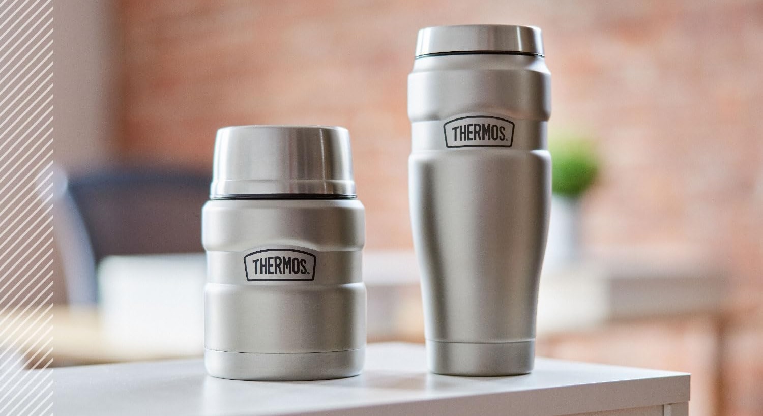 Two silver containers on a table
