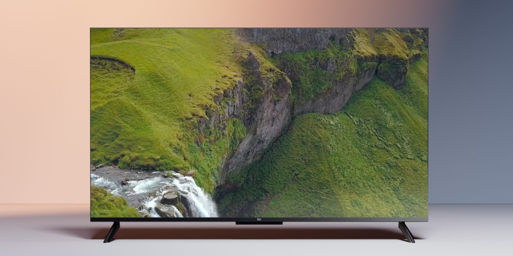 A television with a waterfall and a cliff