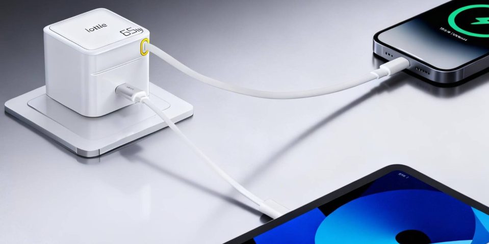 A white rectangular device with a couple of wires connected to it