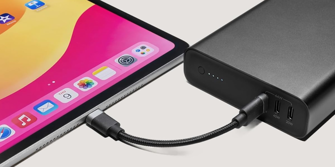 A black power bank and a tablet