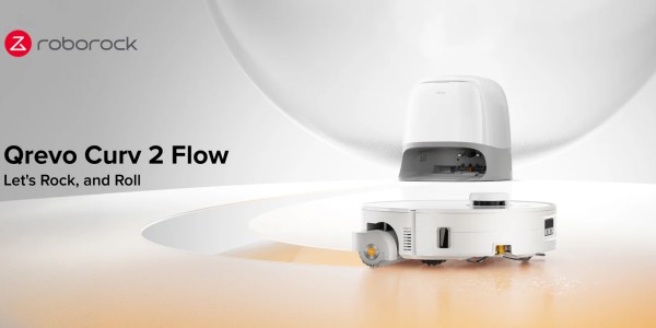 A white robot with a round lid