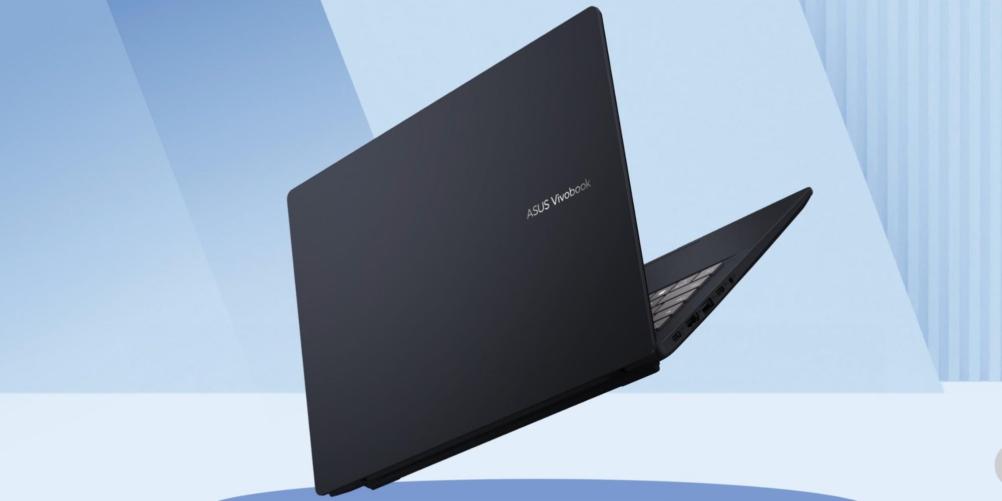 A black laptop computer with a blue background