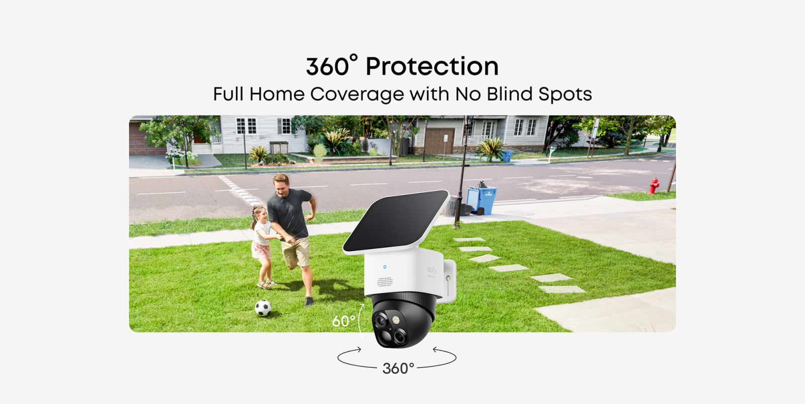 A man and child playing in a yard