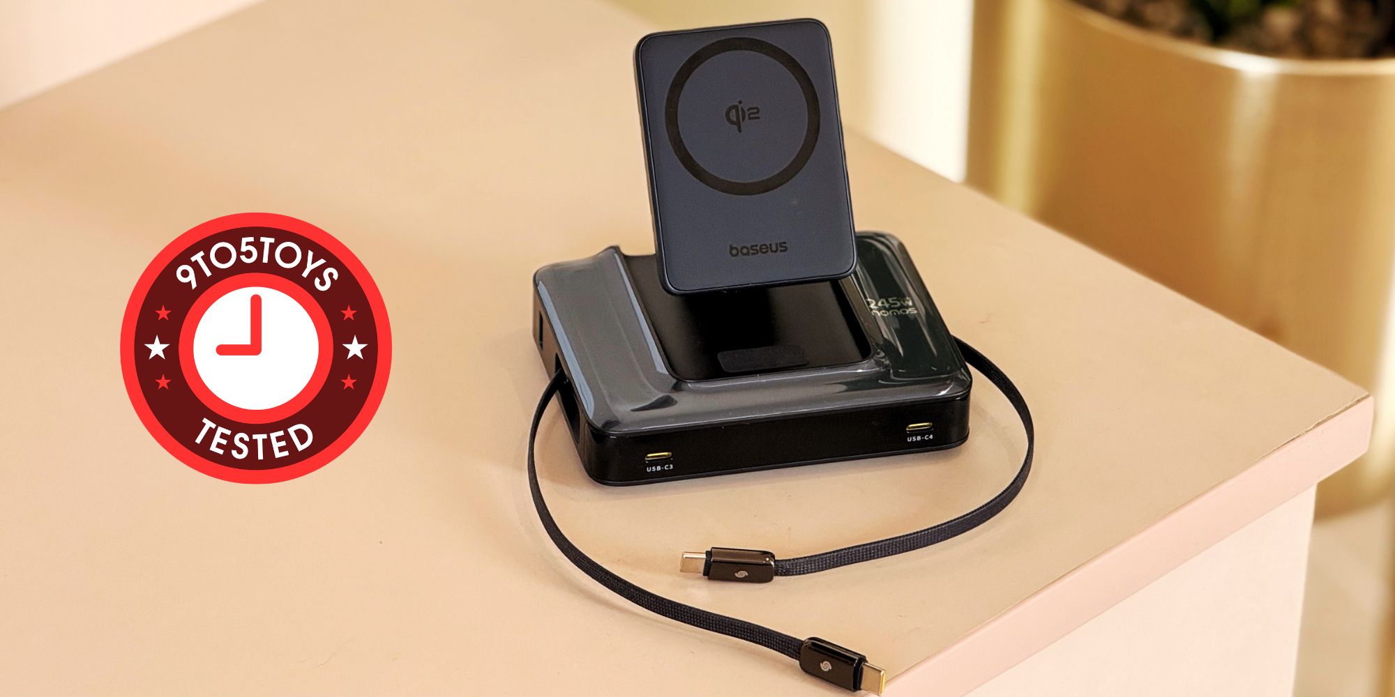 A black device with a black cord