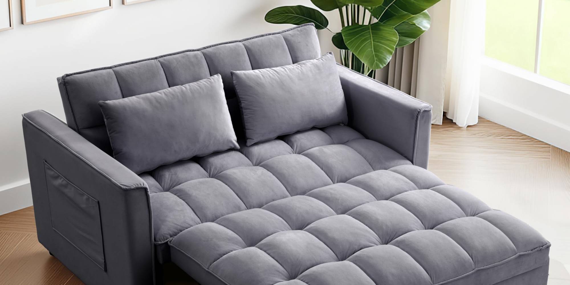 A couch with pillows and a plant in front of it