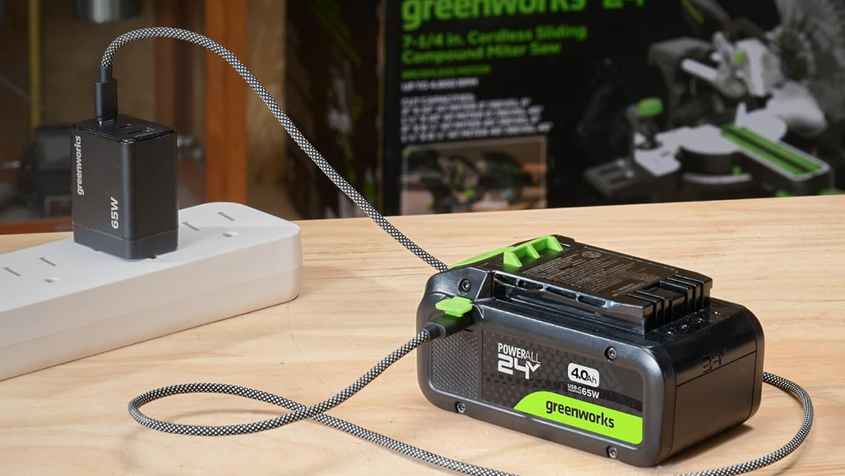 A black and white battery with a cord