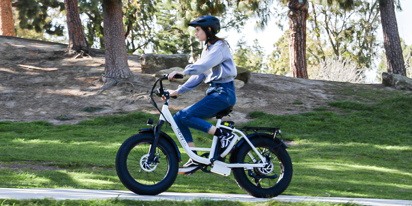 A woman riding a bike