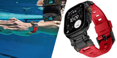 A person swimming underwater with a watch