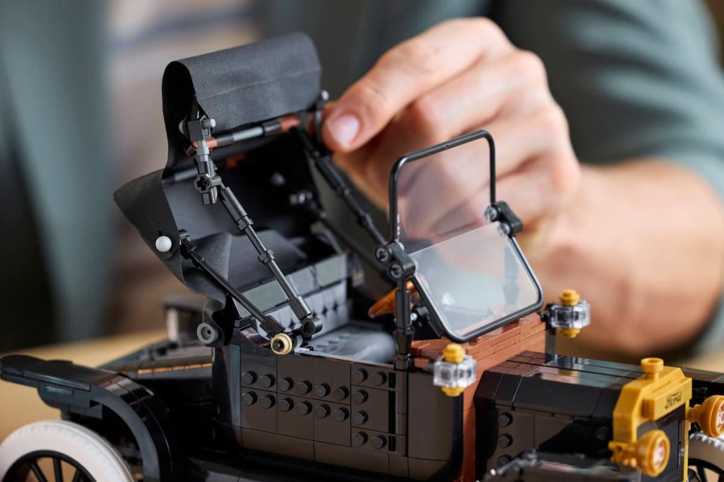 A person holding a LEGO Icons Model T