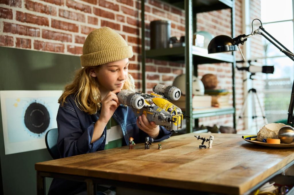 A girl playing with a toy