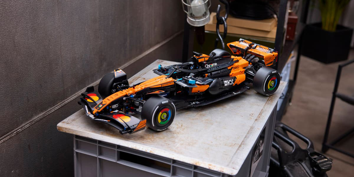 A toy race car on a plastic container