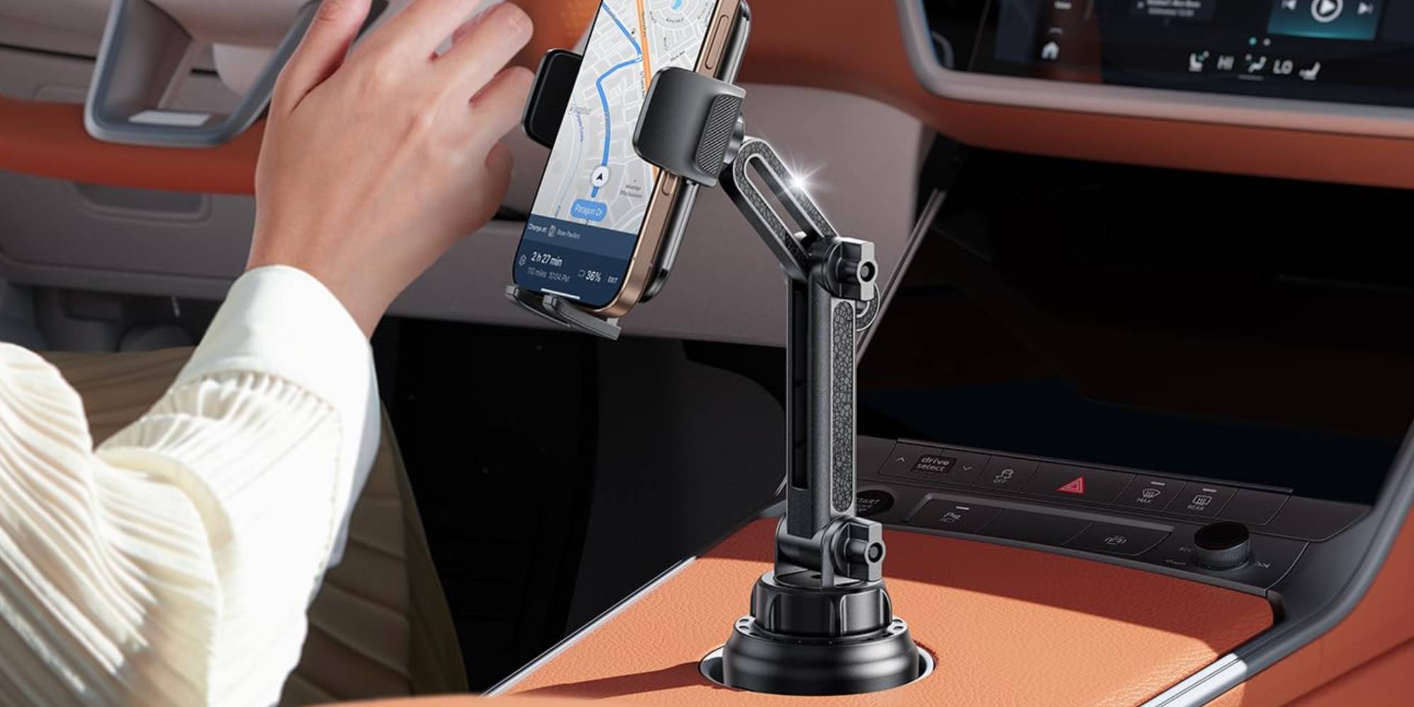 A phone on a holder in a car