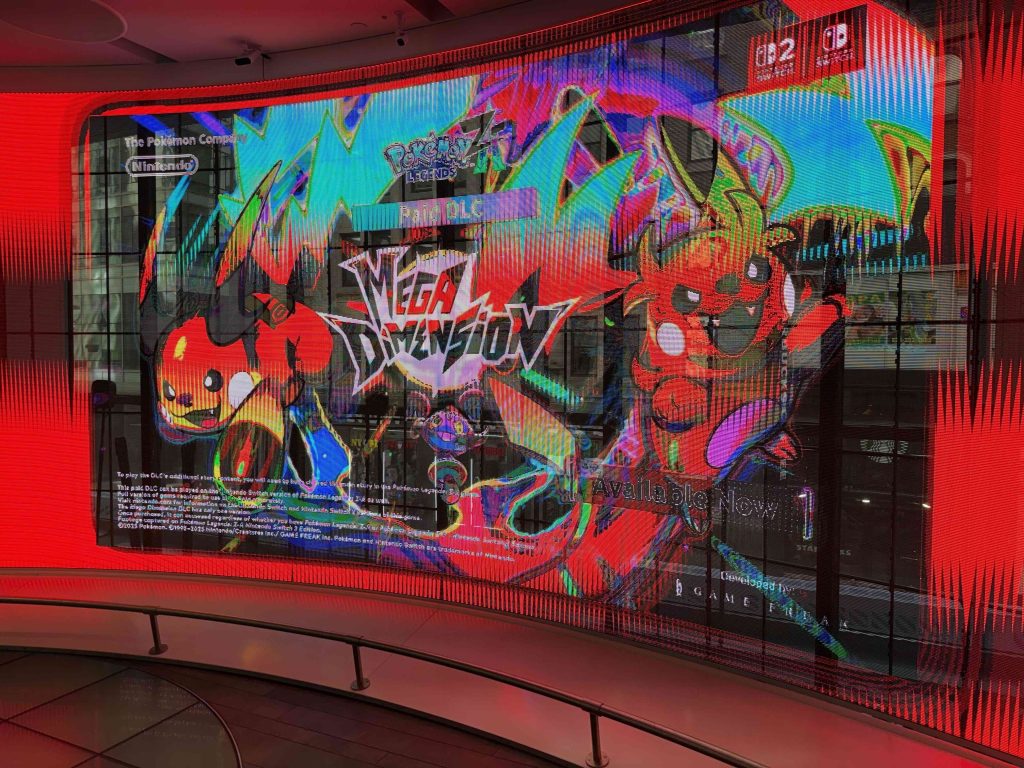 A large screen with cartoon characters on it