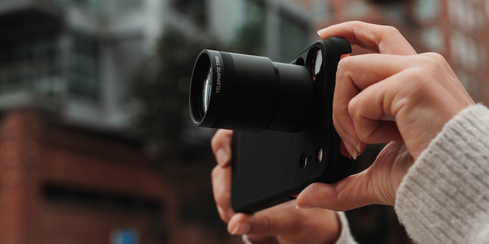 A person holding a camera