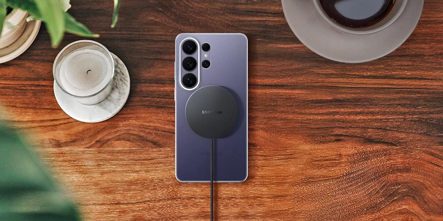 A cell phone charging on a table