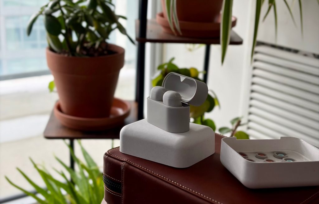 A white object on a brown leather case