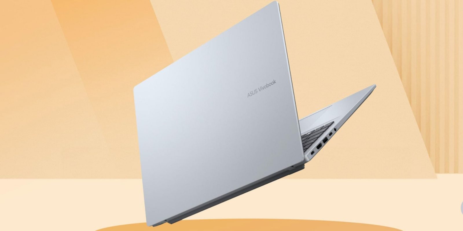 A white laptop with a black keyboard