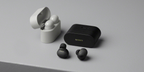 A black and white wireless earbuds