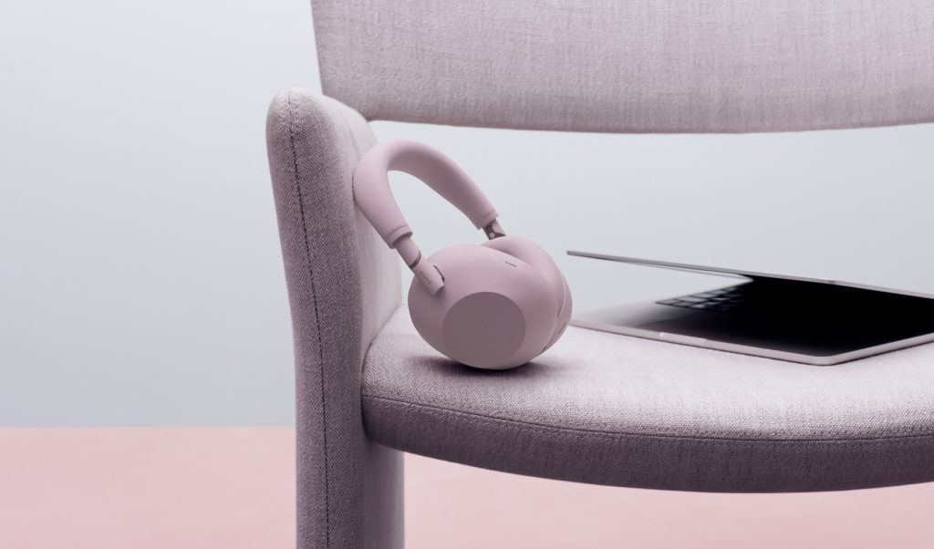 A pink headphones on a chair
