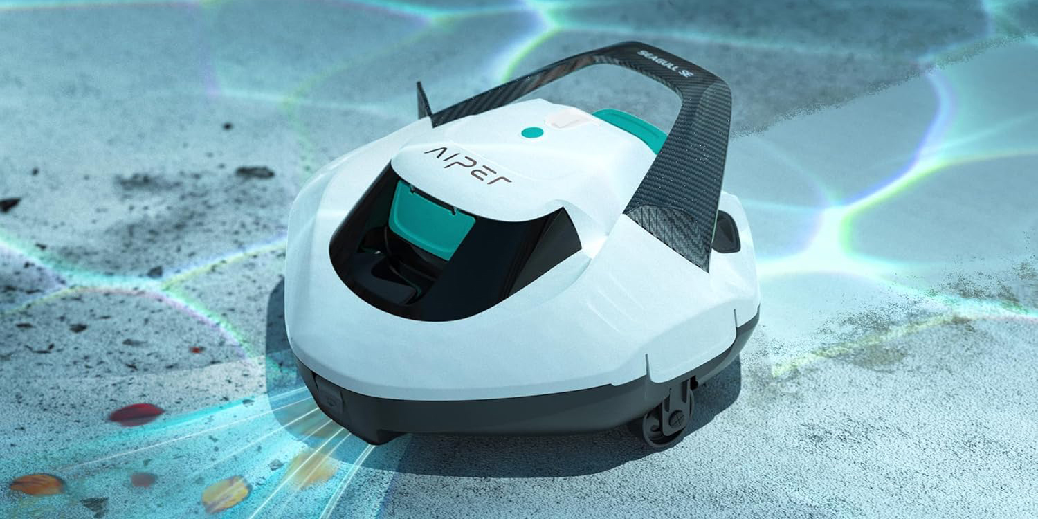 A white robot with black handles