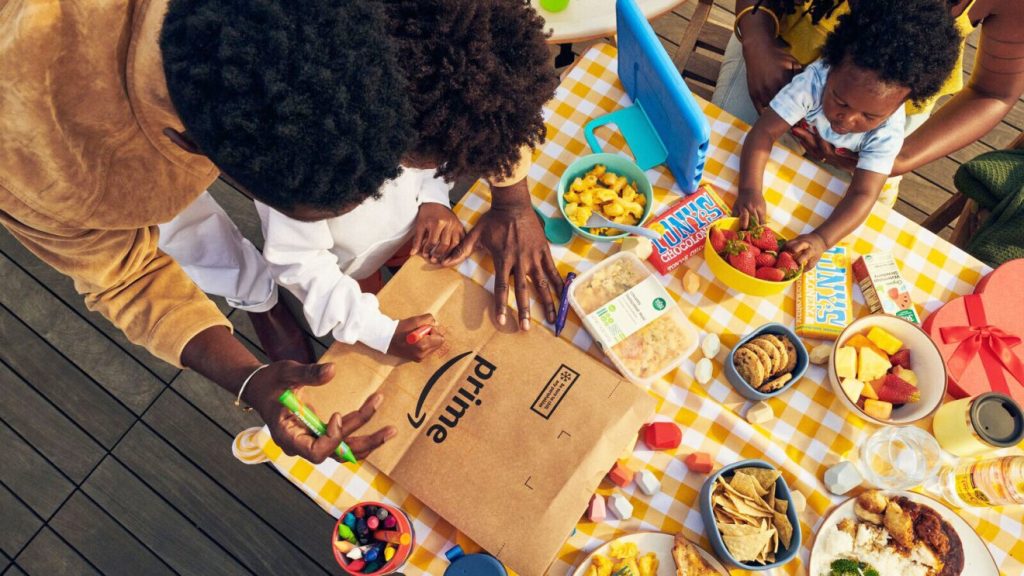 A group of people sitting at a picnic table