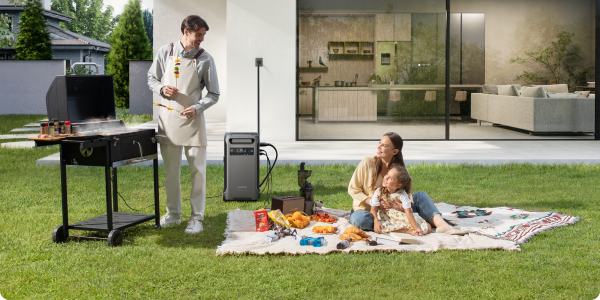 A man and woman on a picnic blanket