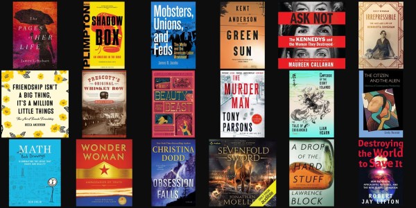 A collection of books on a black background