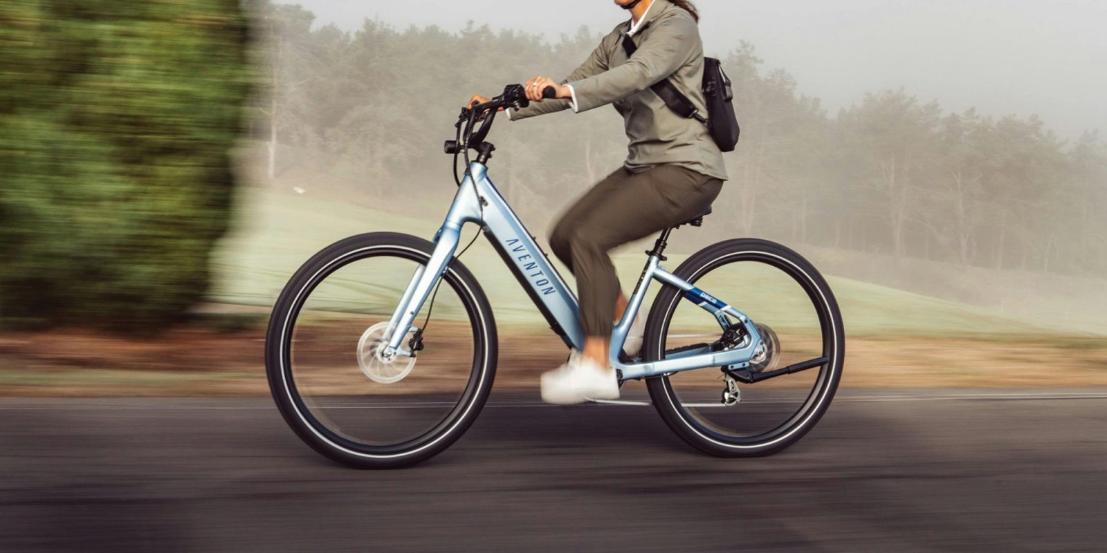 A woman riding a bike