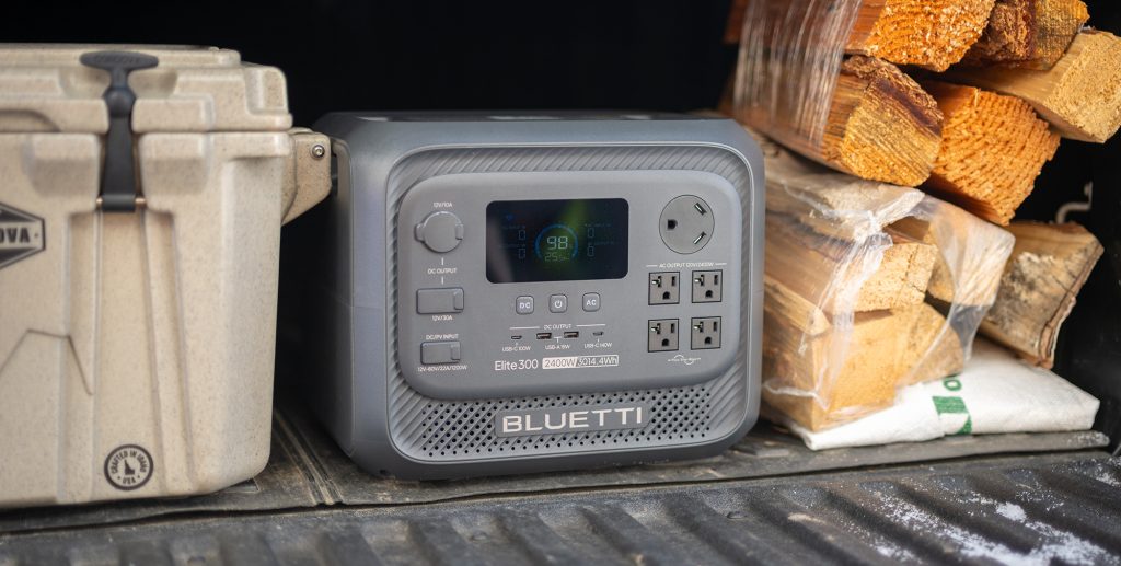 A grey electronic device with buttons and a screen