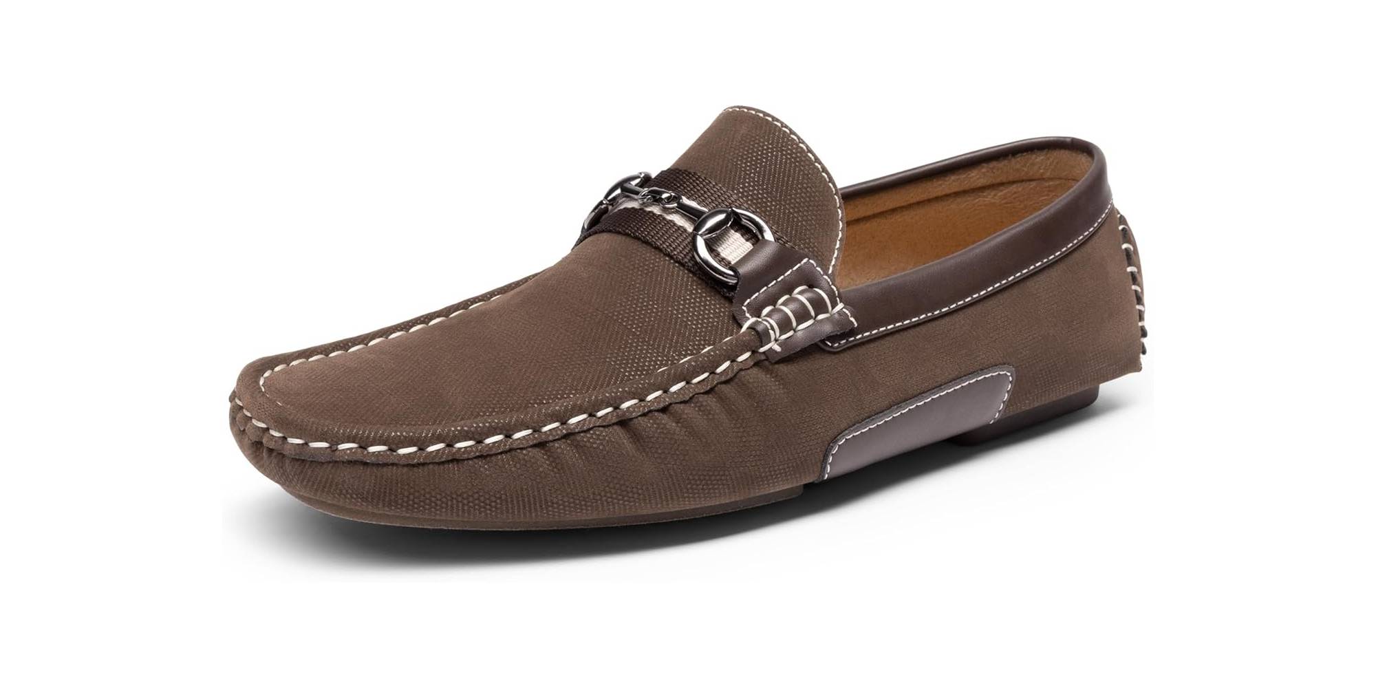 A brown loafer with white stitching