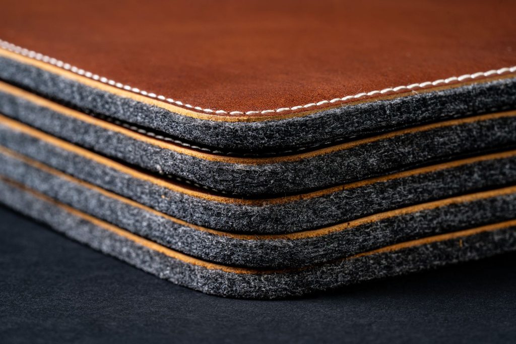A stack of leather coasters