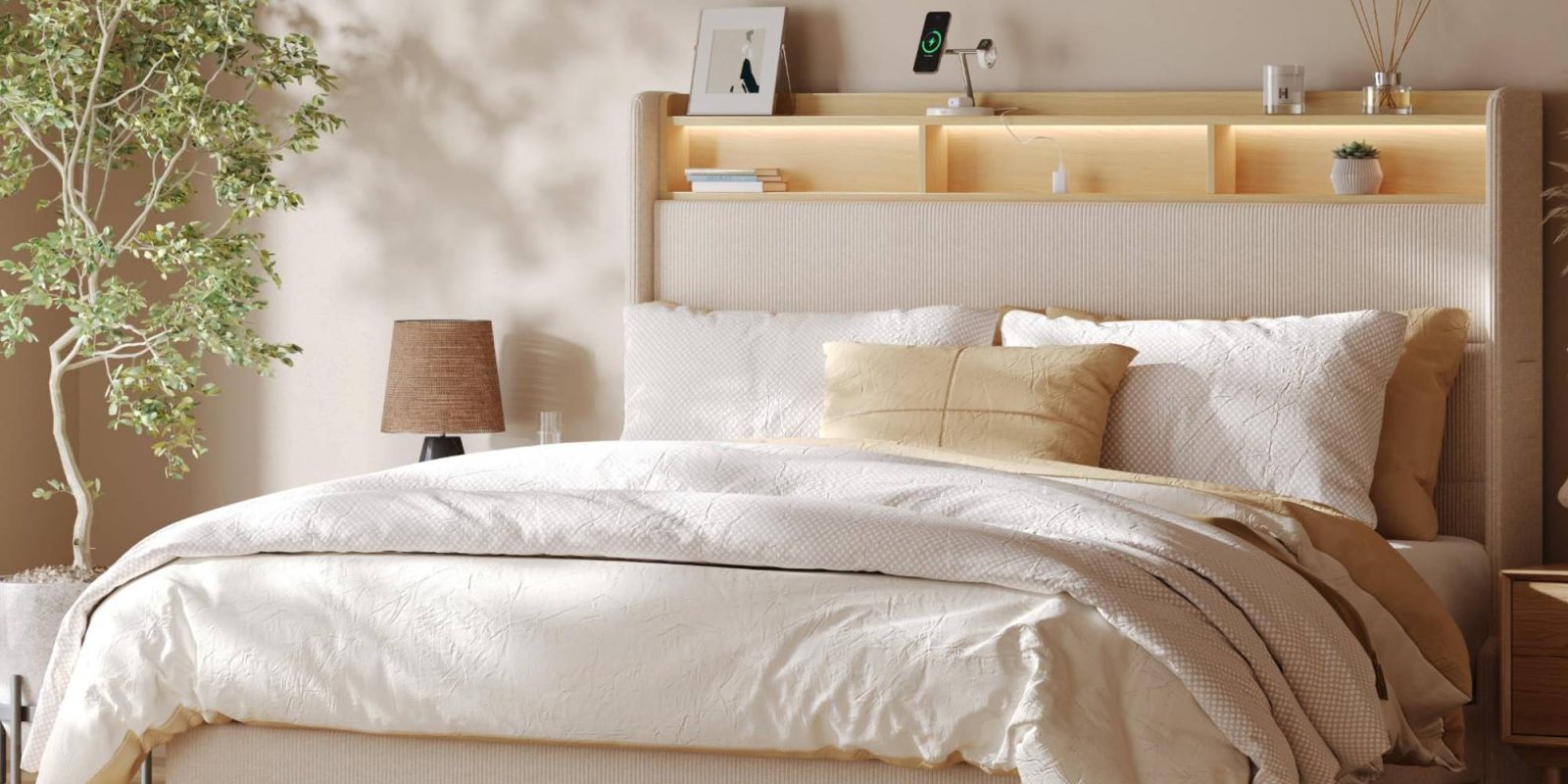 A bed with a headboard and a lamp