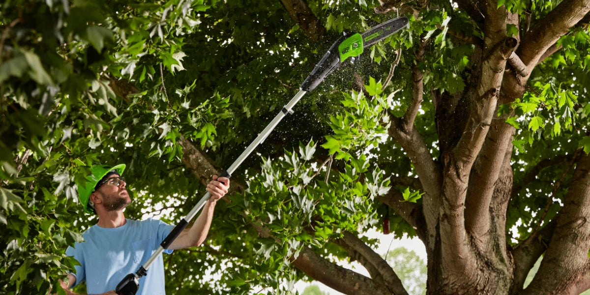 A man holding a lawn mower