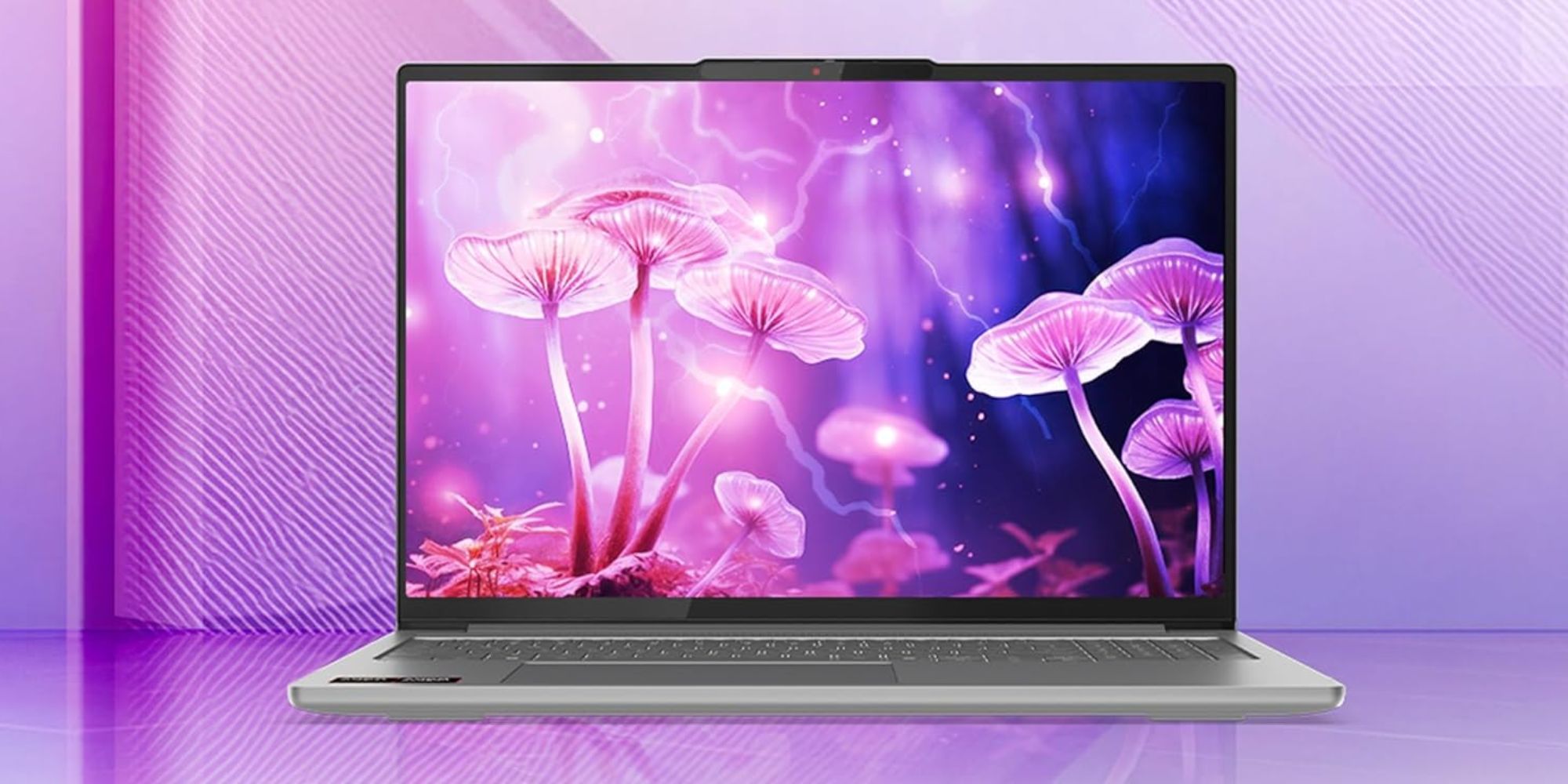 A laptop with purple flowers and lightning