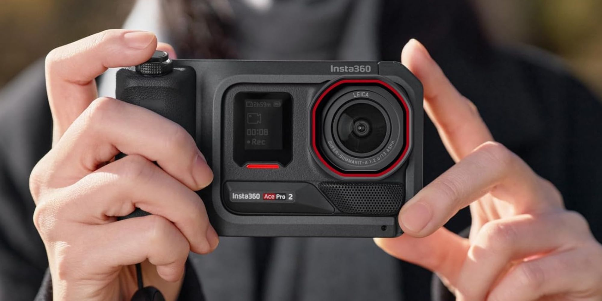 A person holding a camera