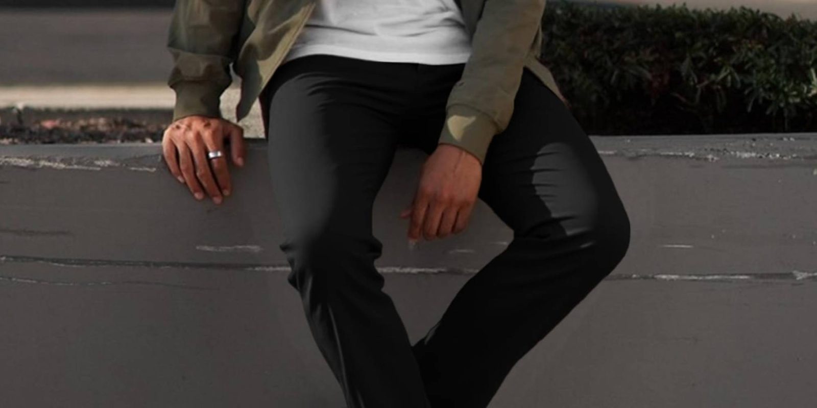 A person sitting on a wall