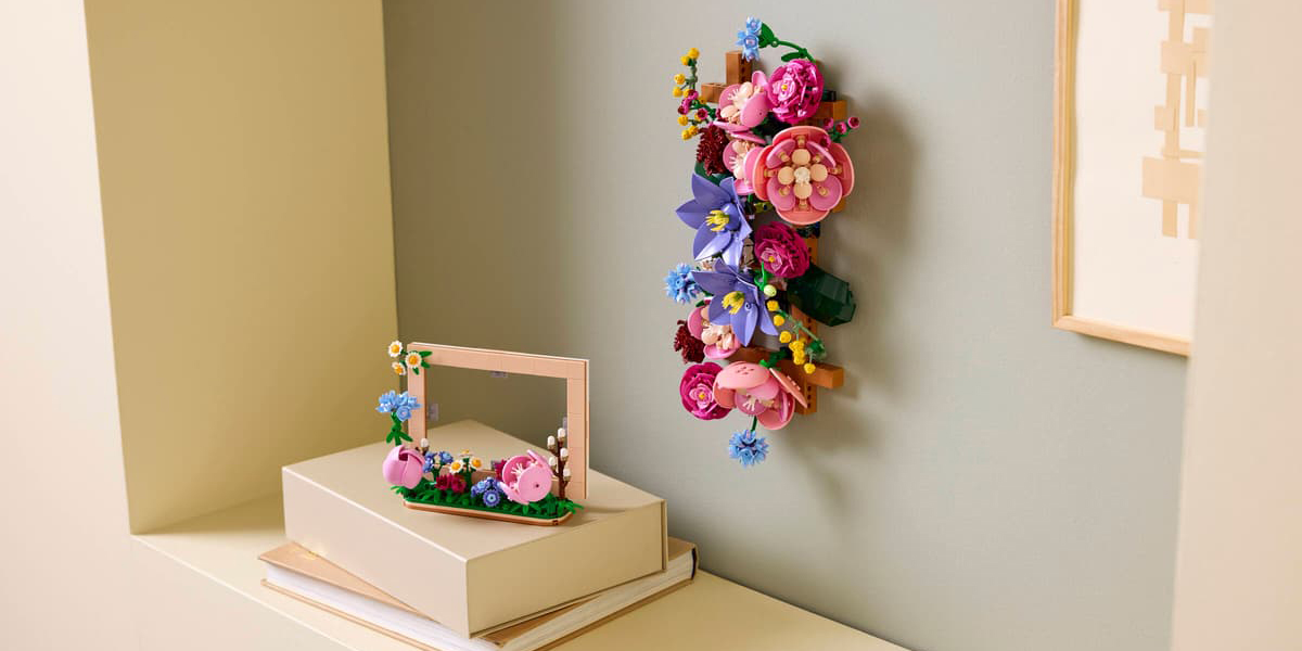 A flower made of legos on a wall