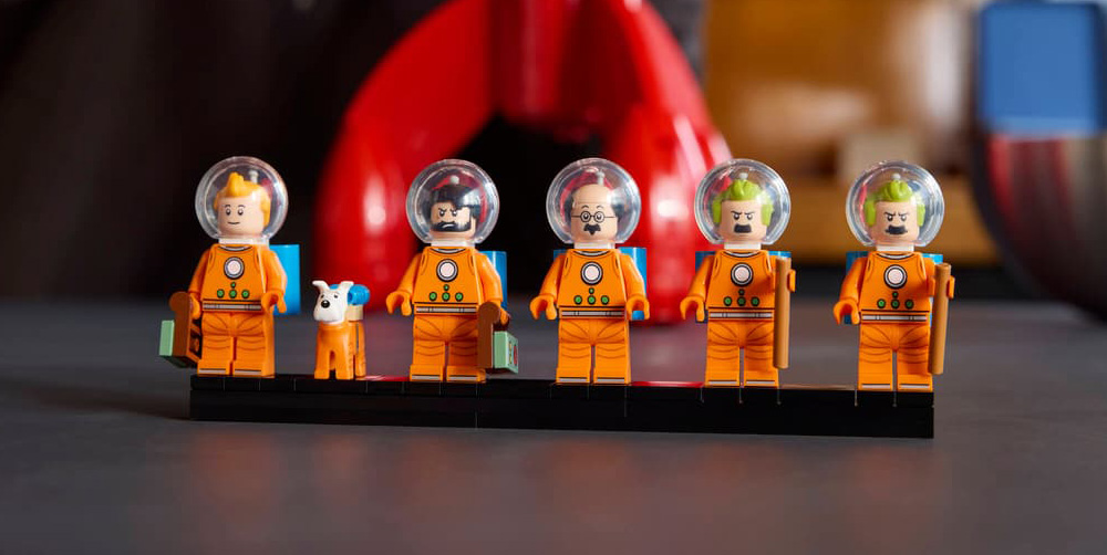 closeup of LEGO tintin, snowy, captain haddock, professor calculus, Thomson, and Thompson