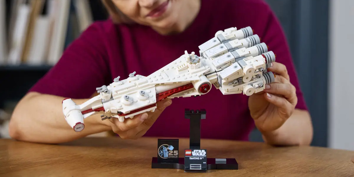 A woman holding a toy