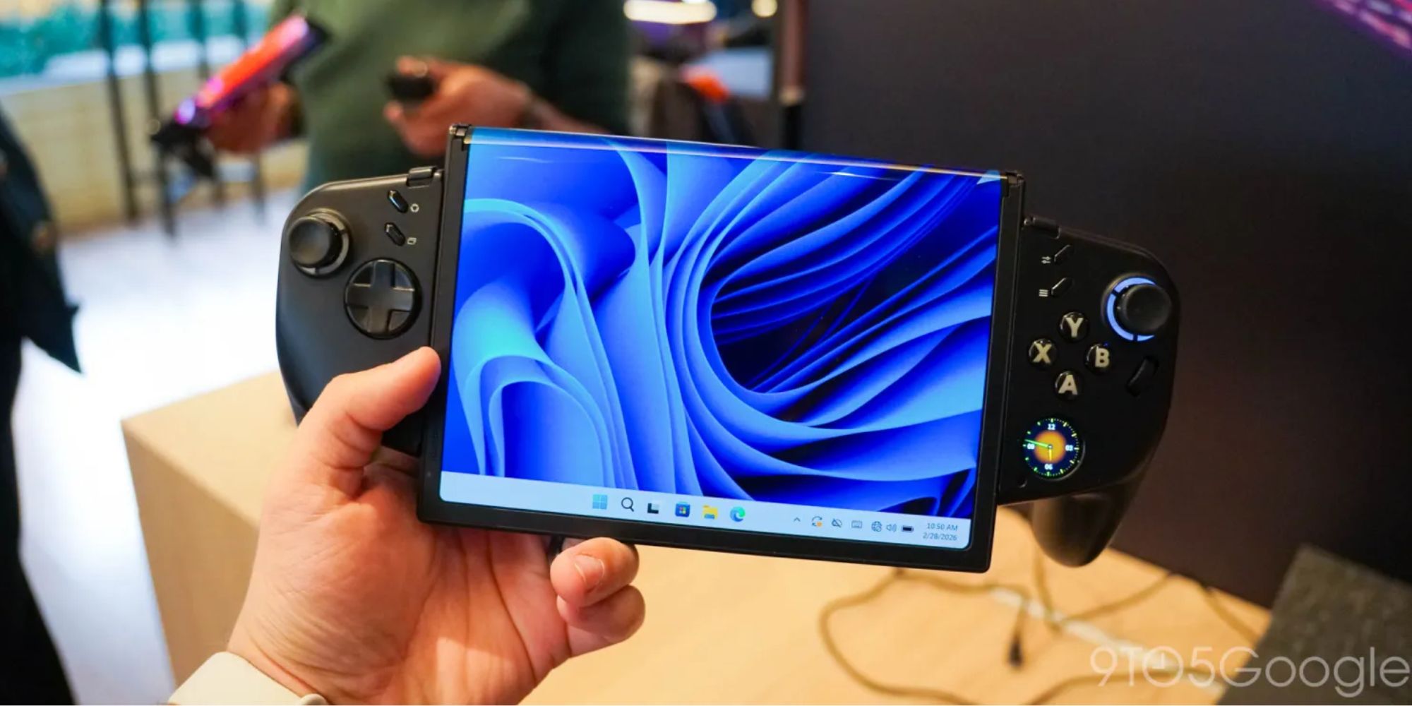 Image showing a person holding Lenovo's Legion Go handheld concept device.