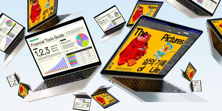 Several laptops flying in the air