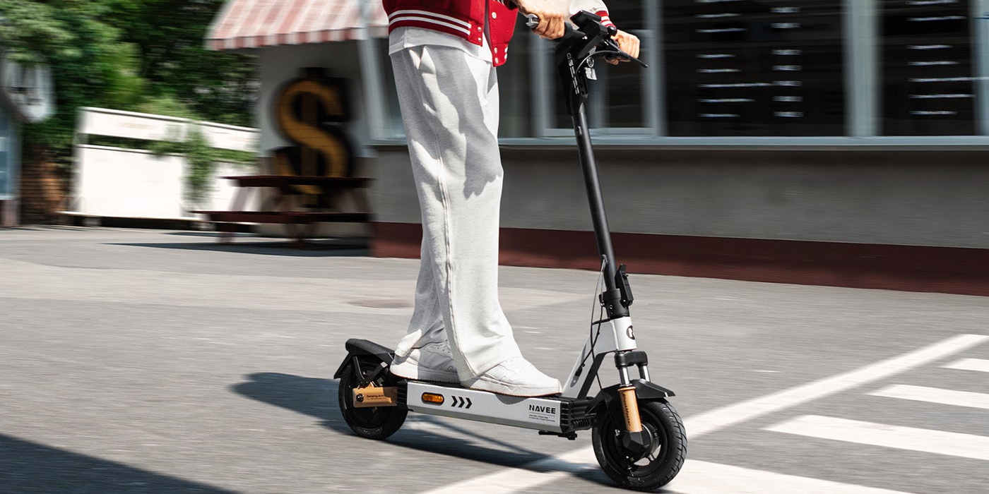 A person riding a scooter