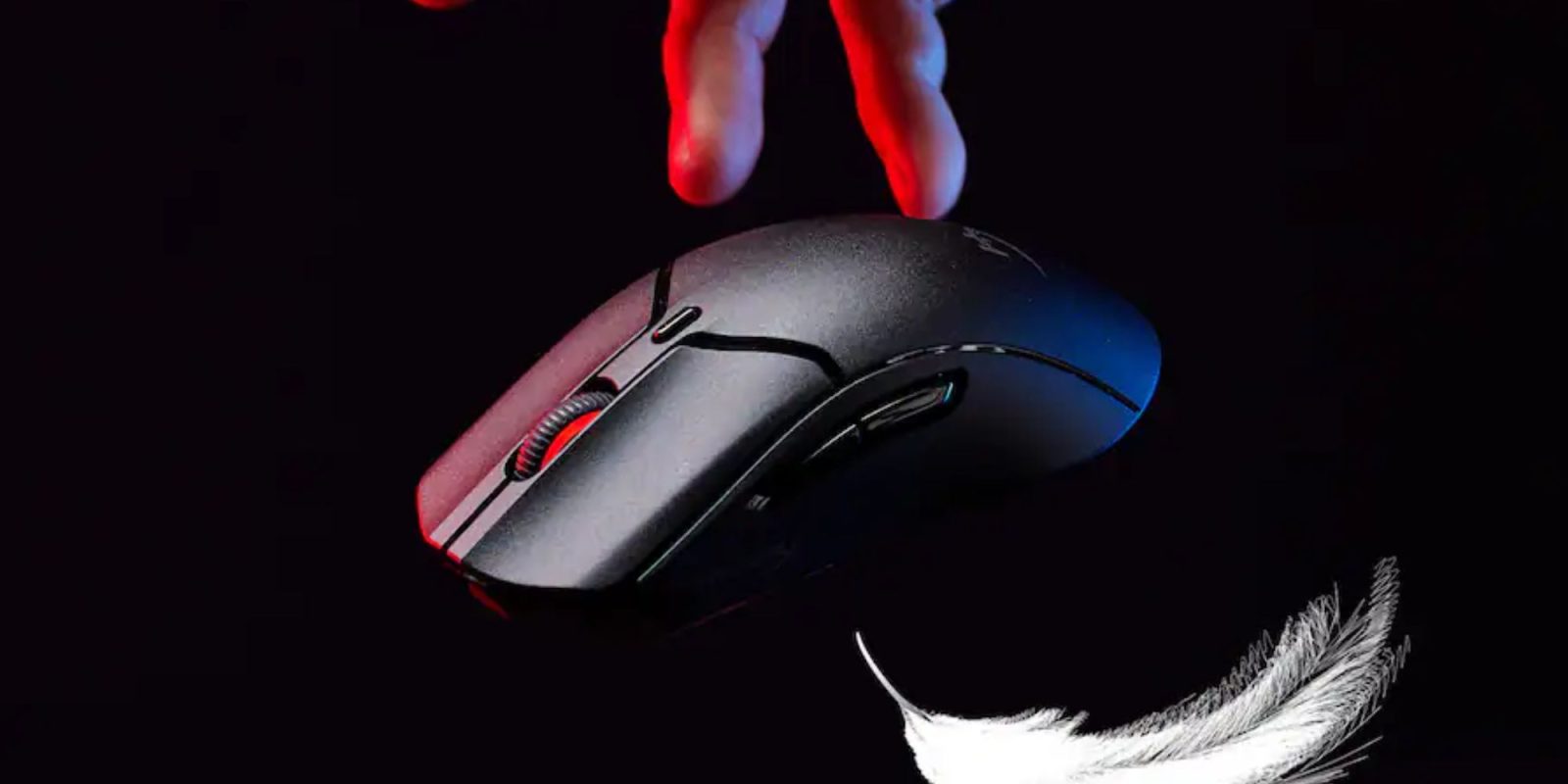 A hand holding a computer mouse
