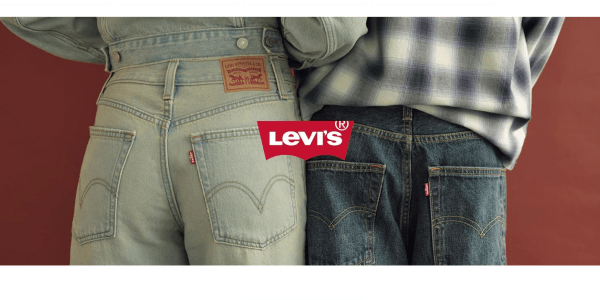 A pair of jeans with a red logo