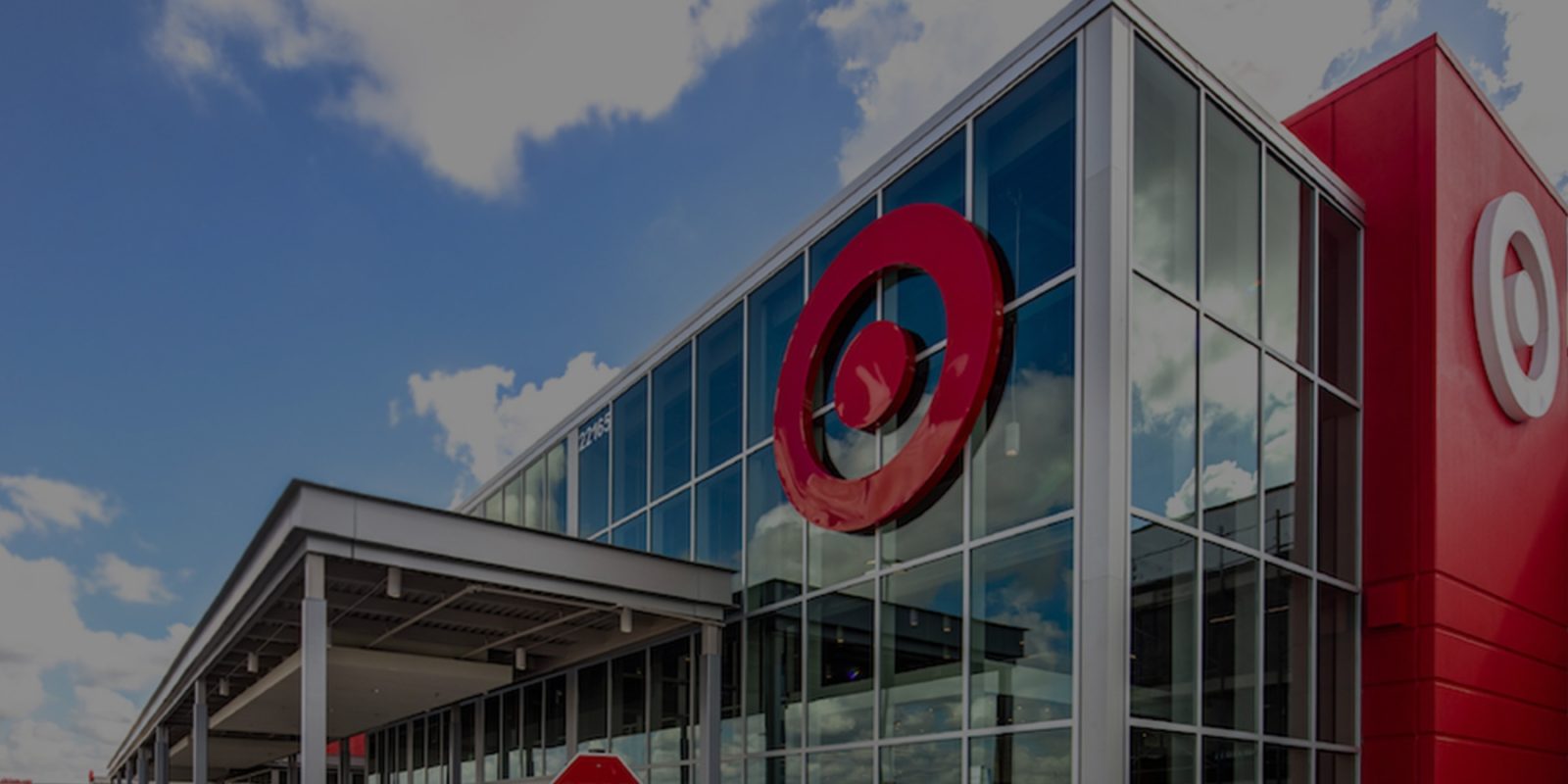 A building with a red logo on the side