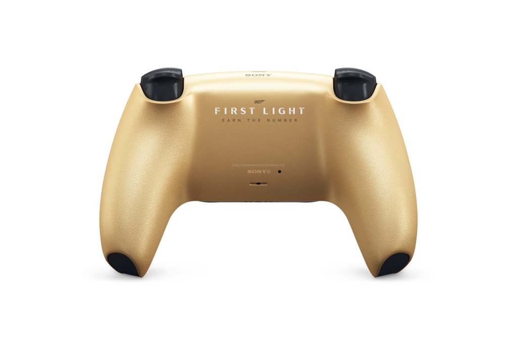 A gold and black game controller