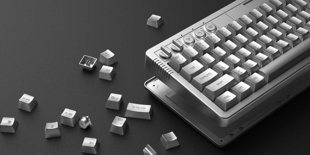 A keyboard with many keys