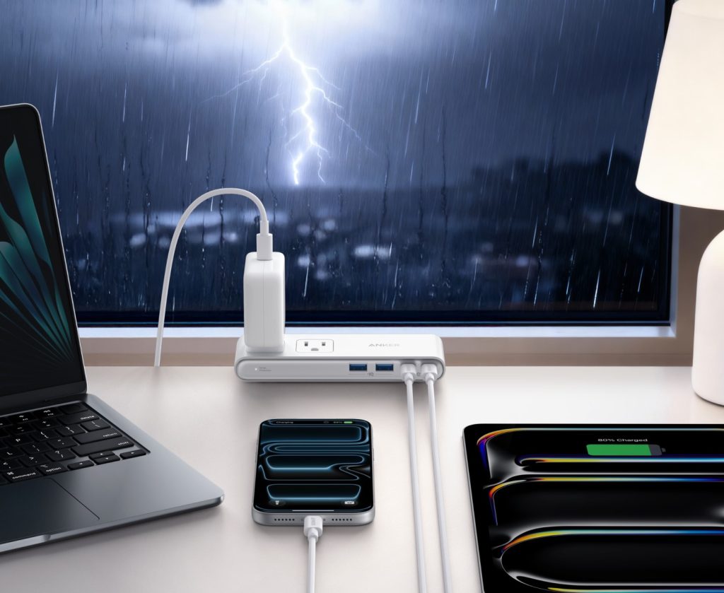 A laptop and phone on a desk