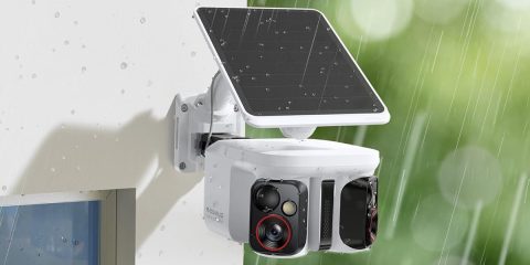 A white camera with a solar panel